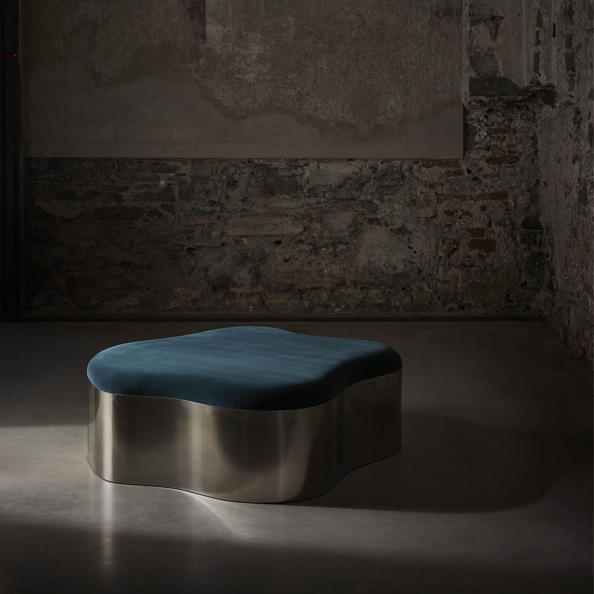 Lily ottoman in polished stainless steel and COM 
