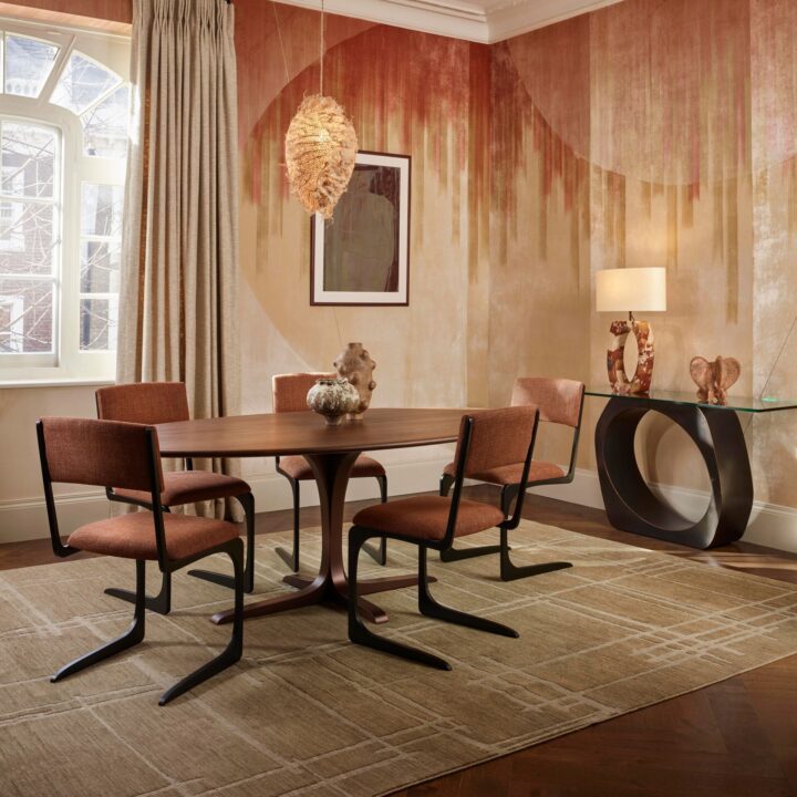 Finished in "Bronze" with Walnut top, and Angel chairs