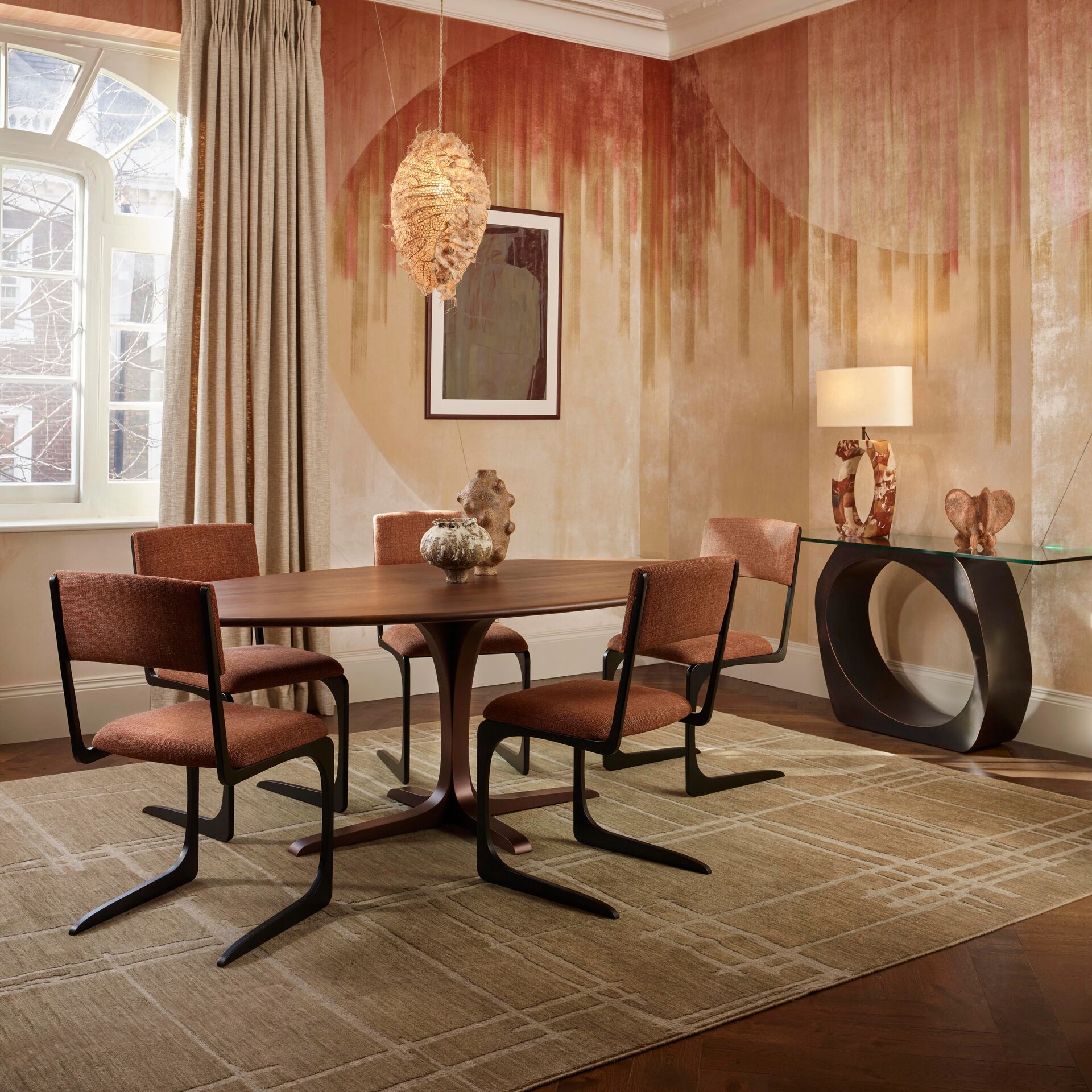 Finished in "Bronze" with Walnut top, and Angel chairs