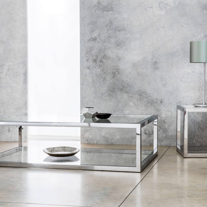 Finished in Polished stainless steel with a clear glass top