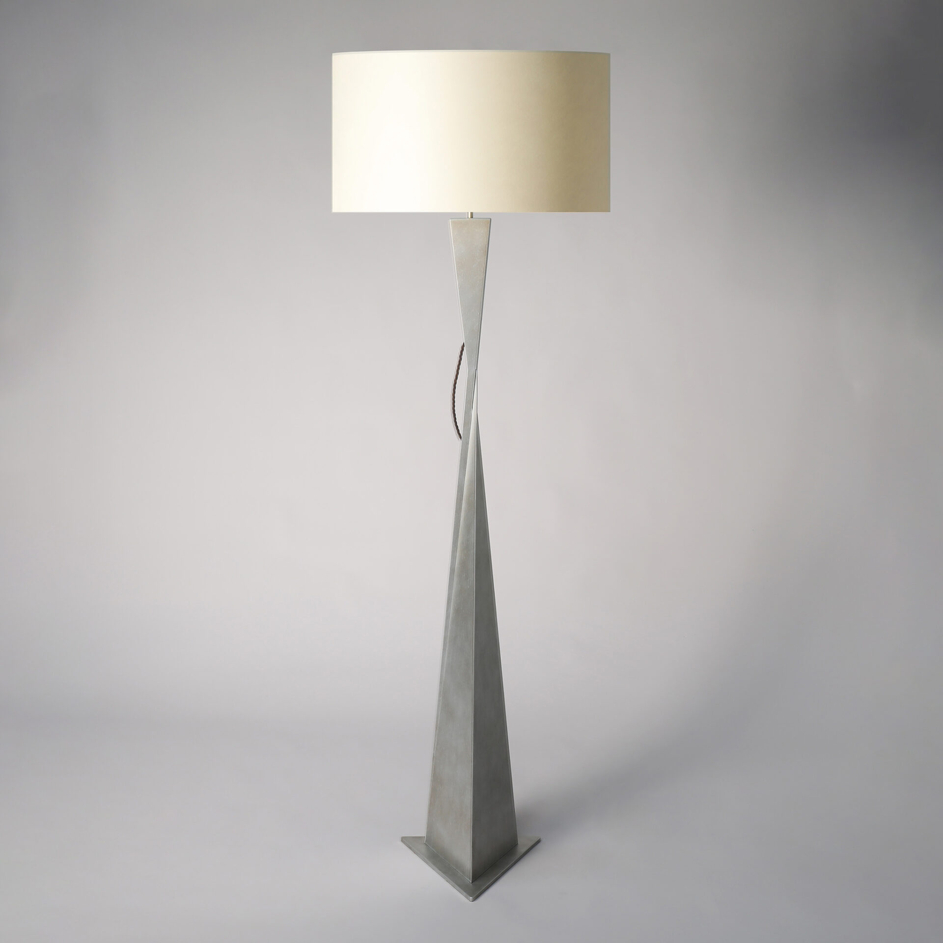 AVA floor lamp finished in “Persian Silver"