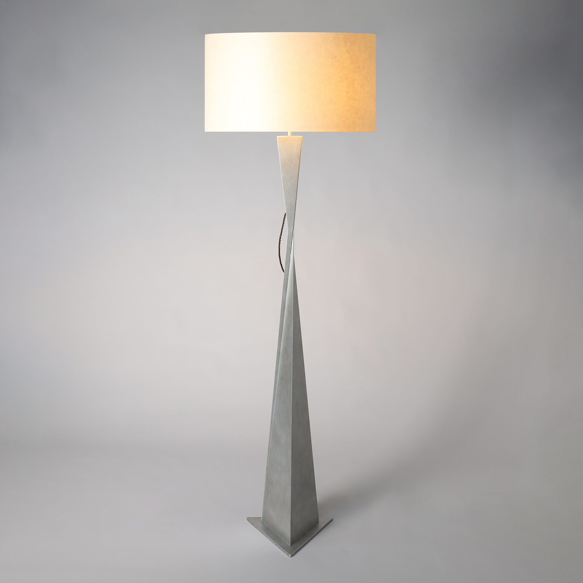 AVA floor lamp finished in “Persian Silver"