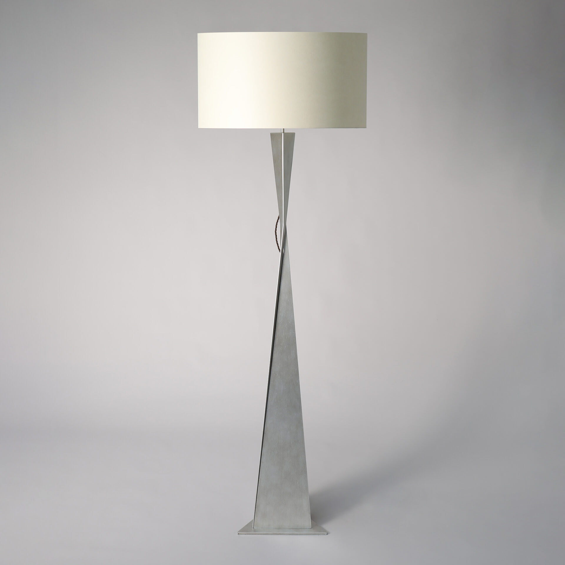 AVA floor lamp finished in “Persian Silver"