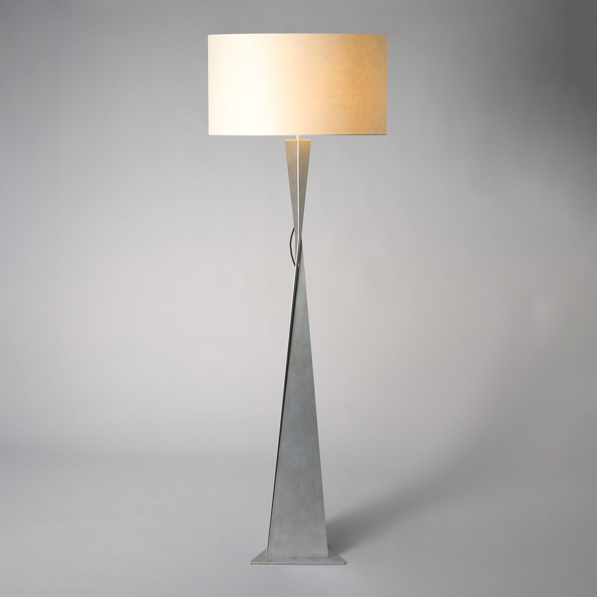 AVA floor lamp finished in “Persian Silver"