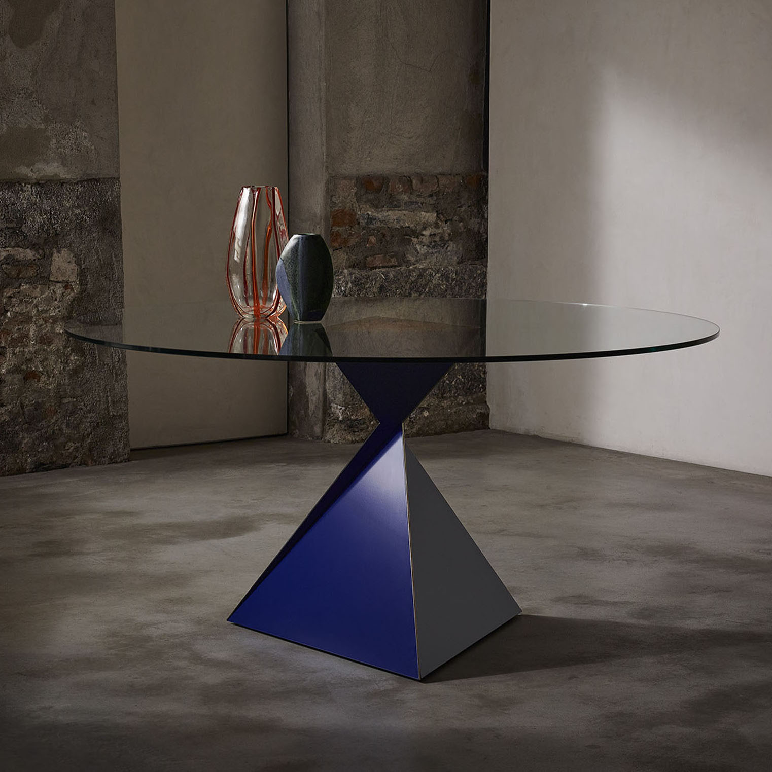Ava dining table with glass top and polished bronze insert