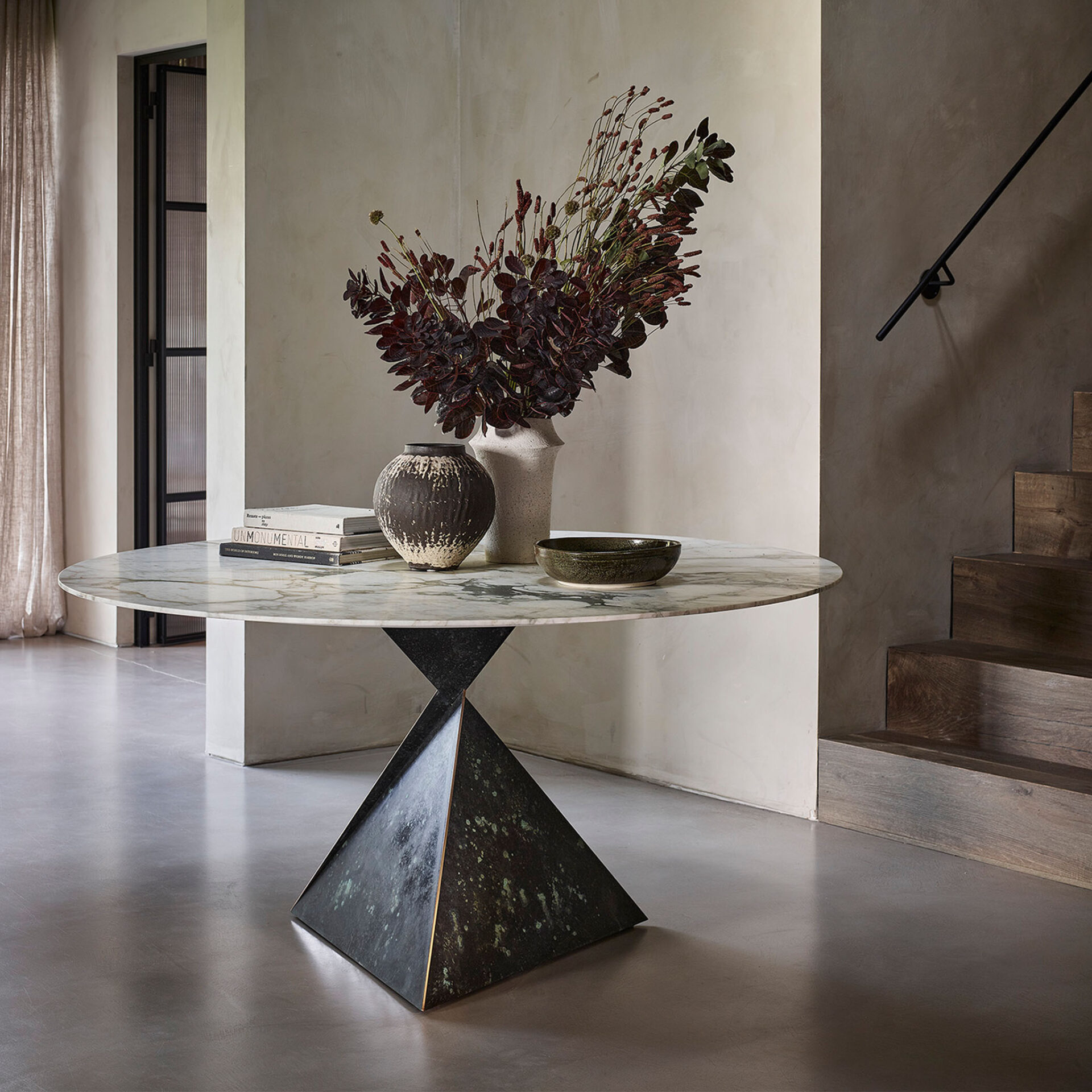 In Bronze "Bottle Green" with a Calacatta Verde marble top