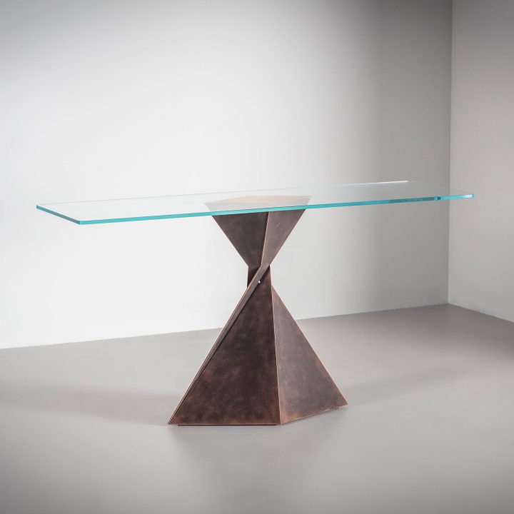 Finished in "Antique Bronze" with a clear glass top