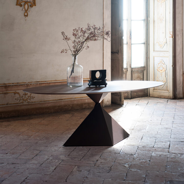 Oval wooden dining table