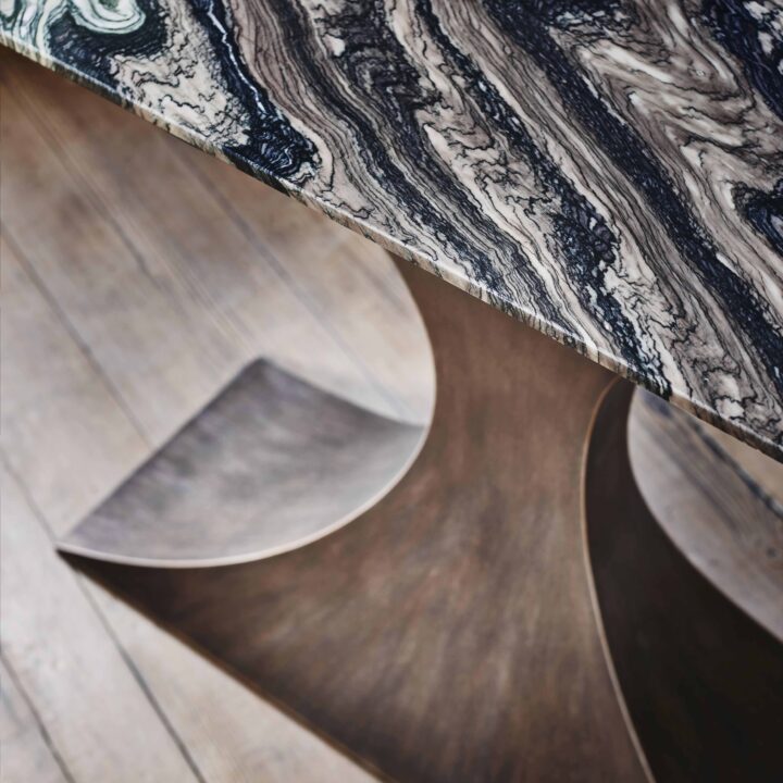 Finished in "Rose Pewter" with a Rosso Luana marble top