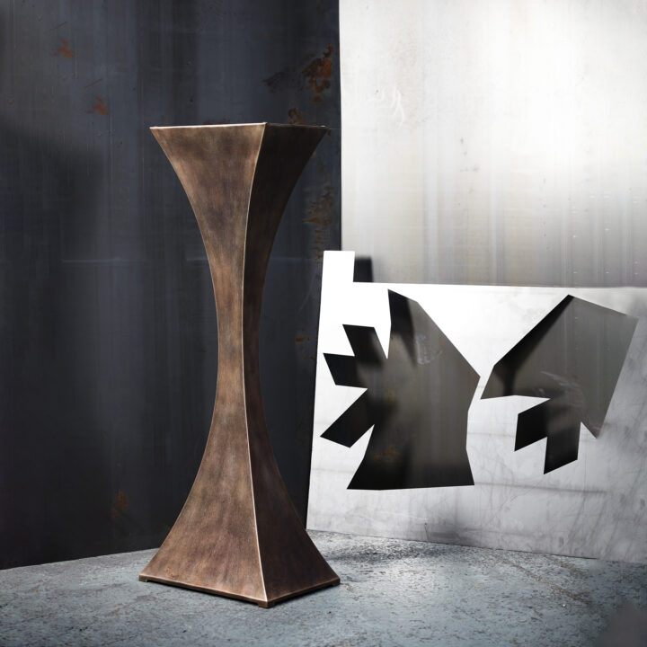 Capricorn Plinth in finished in "Rose Pewter"