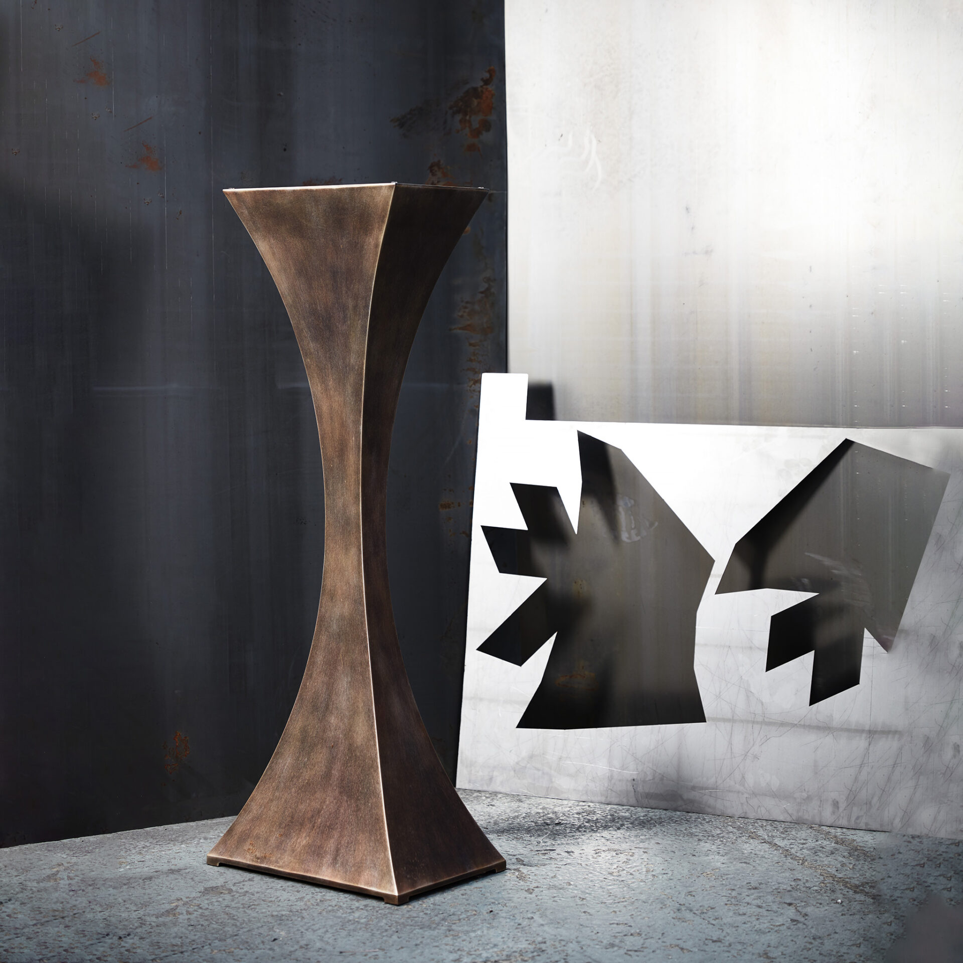 Capricorn Plinth in finished in "Rose Pewter"