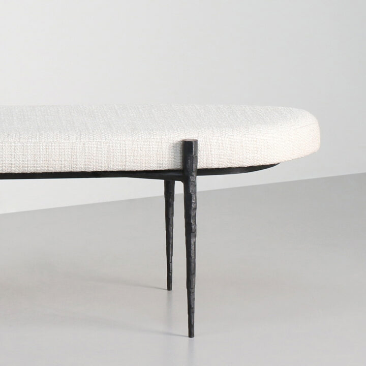 Hammered Steel legs upholstered in a cream boucle