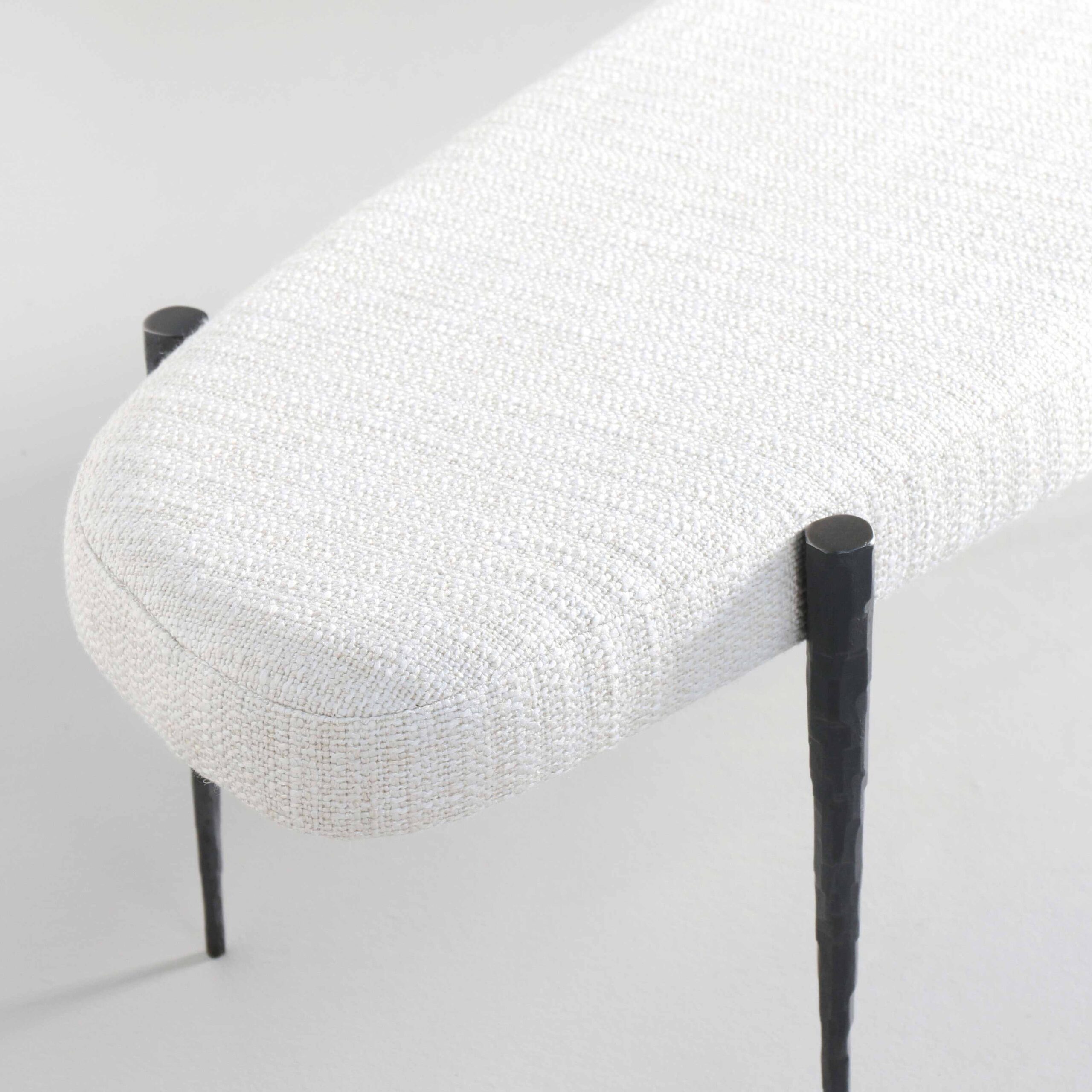 Hammered Steel legs upholstered in a cream boucle