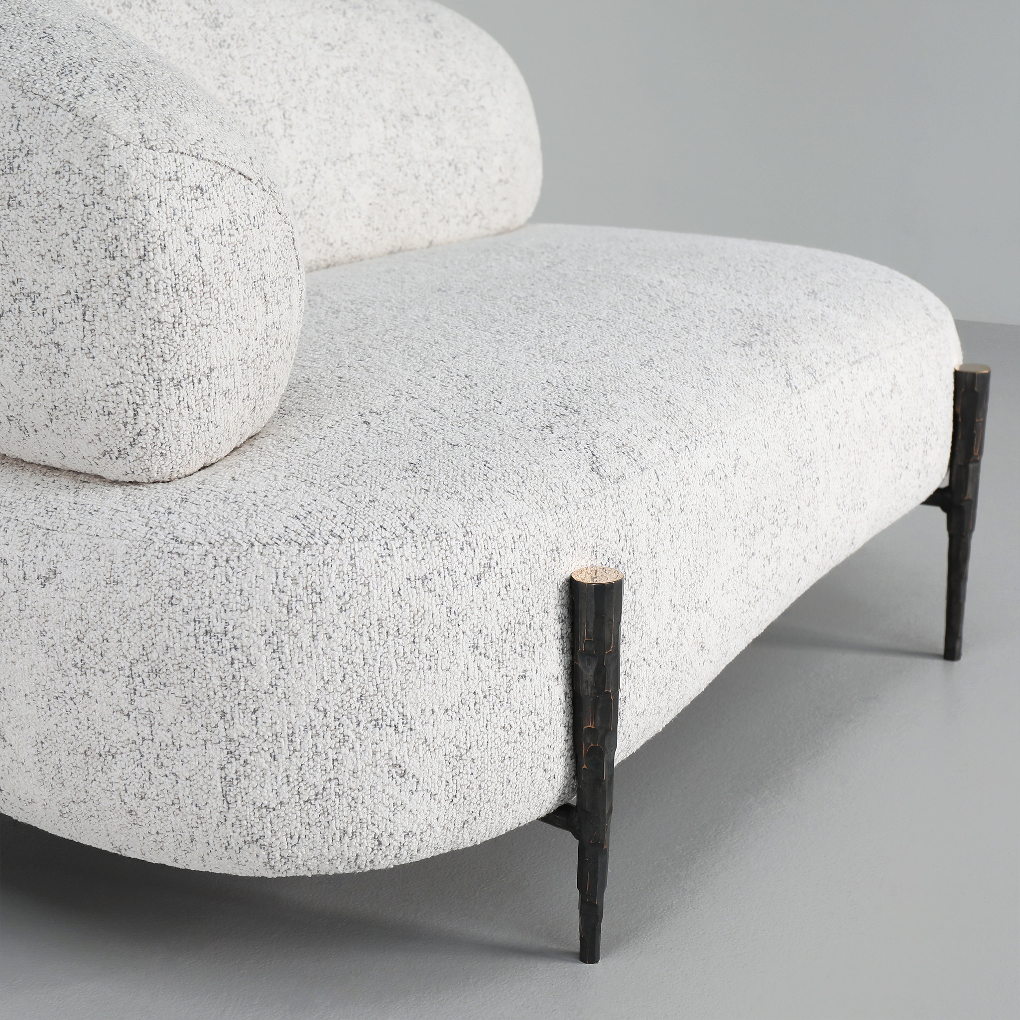 Cloud sofa with hammered bronze legs (detail)
