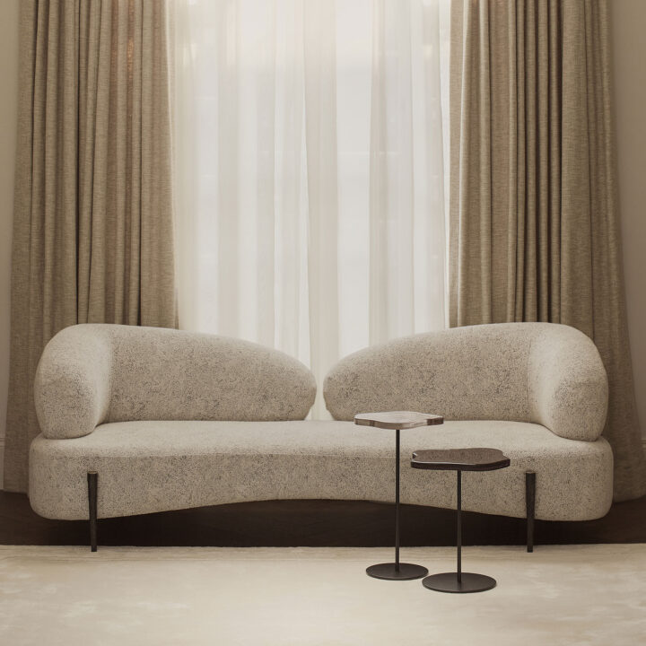 Cloud sofa with hammered bronze legs and two Lily cocktail tables