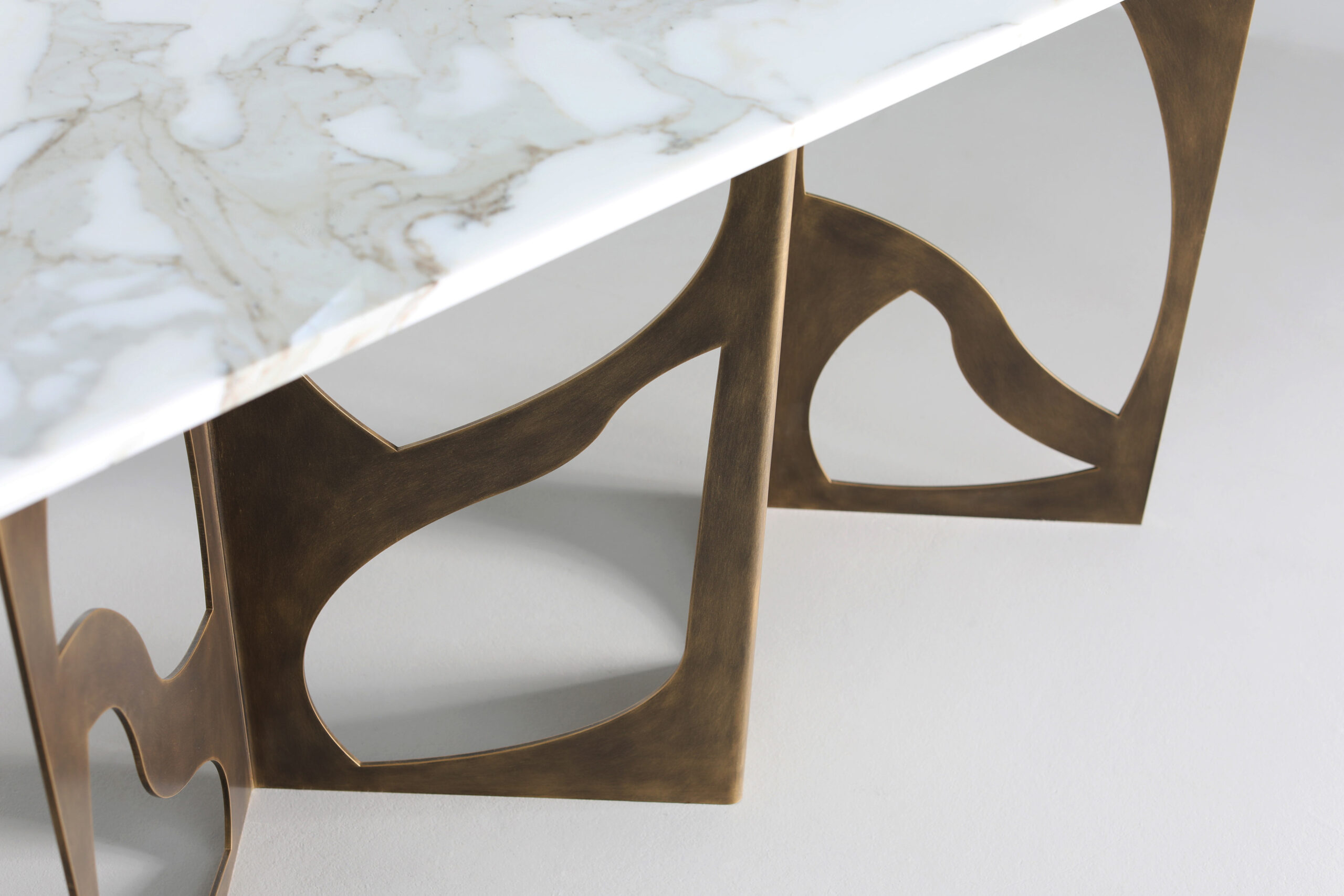 Finished in "Florentine Gold" with Calacatta Oro marble top