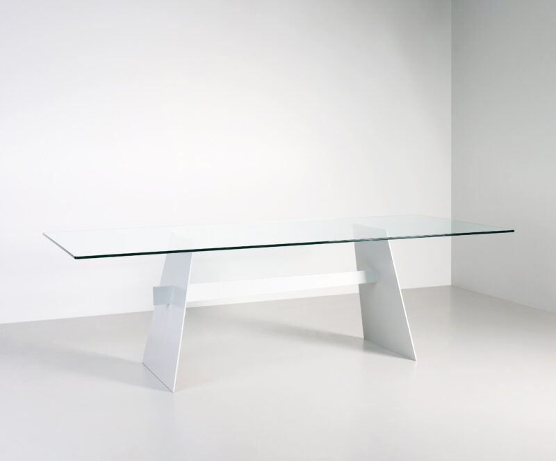 White contemporary metal table with glass top