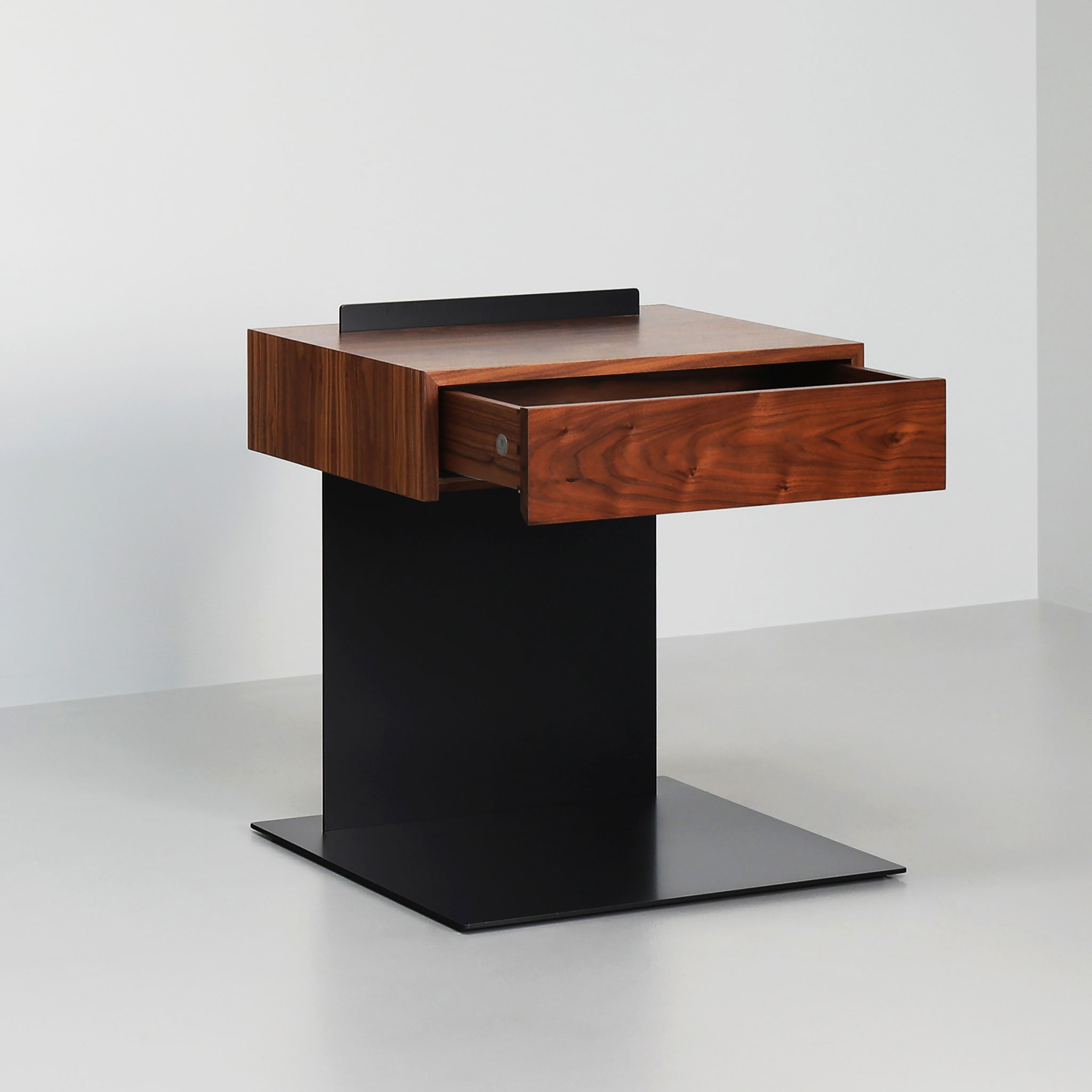 Finished in "Charcoal" with a walnut top