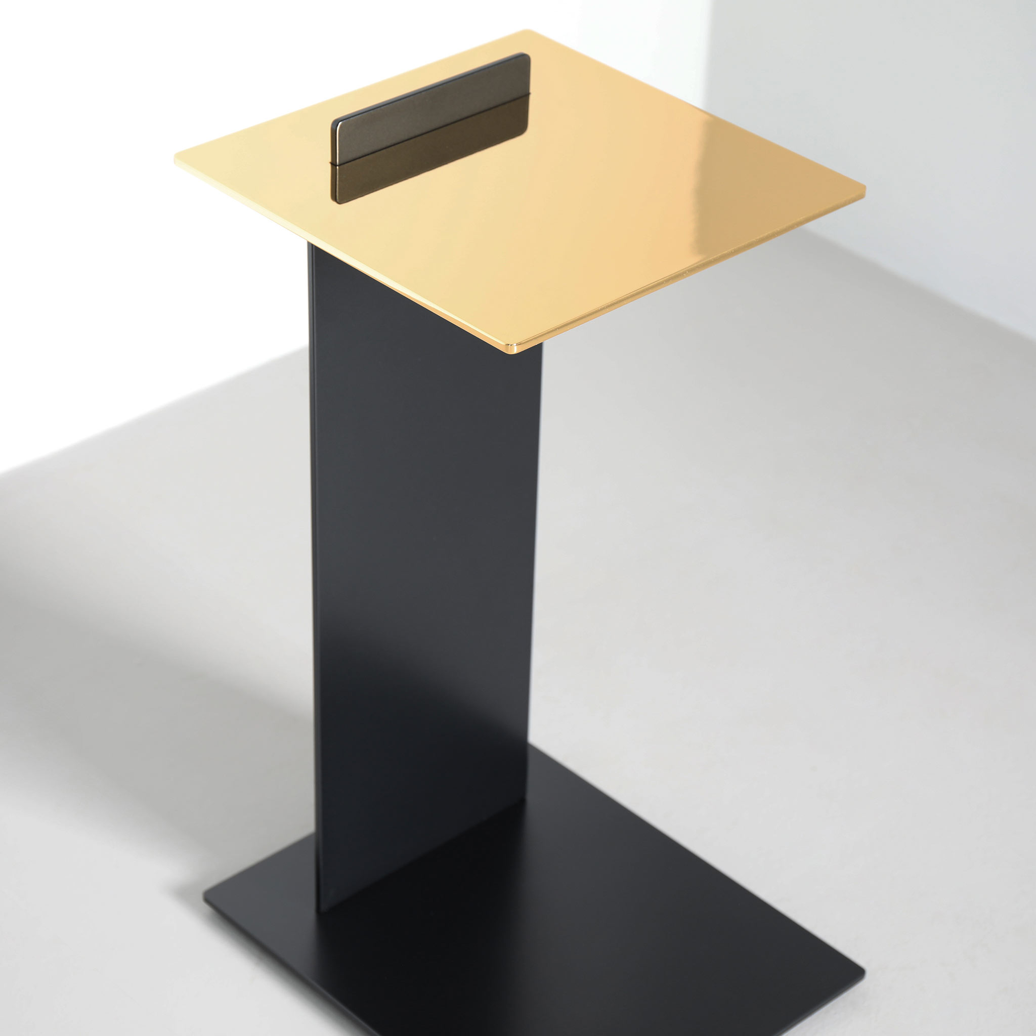 Finished in "Charcoal" with gold plated top