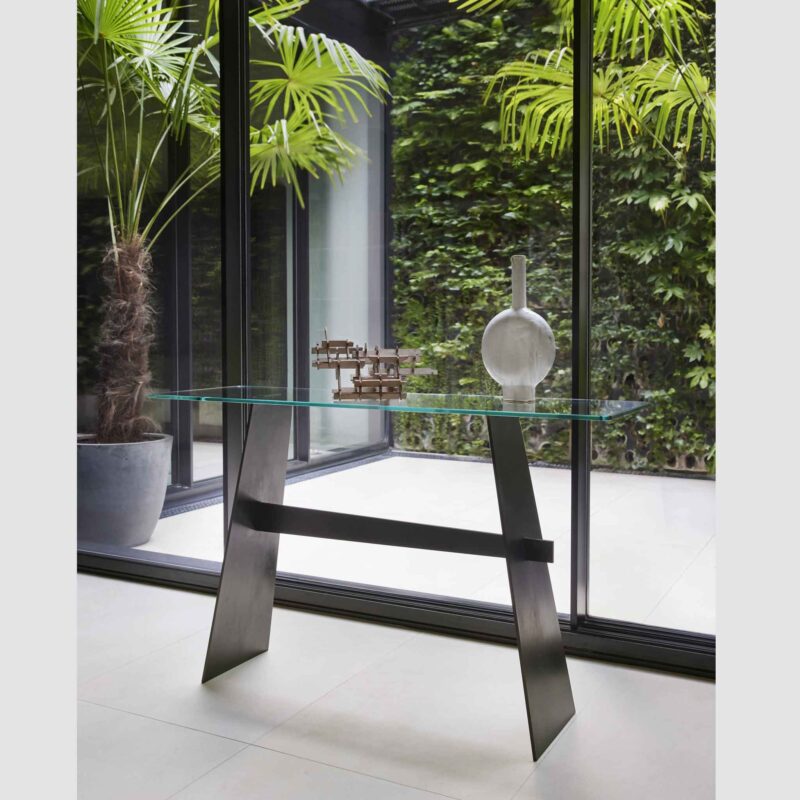 Metal console table with glass