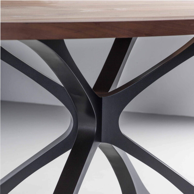Charcoal finish with a solid Walnut oval top dining table
