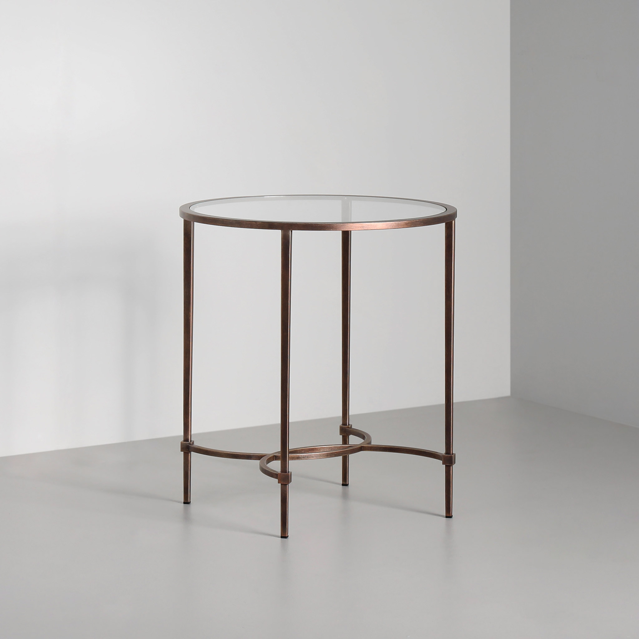 Finished in "Rose Pewter" with a clear glass top