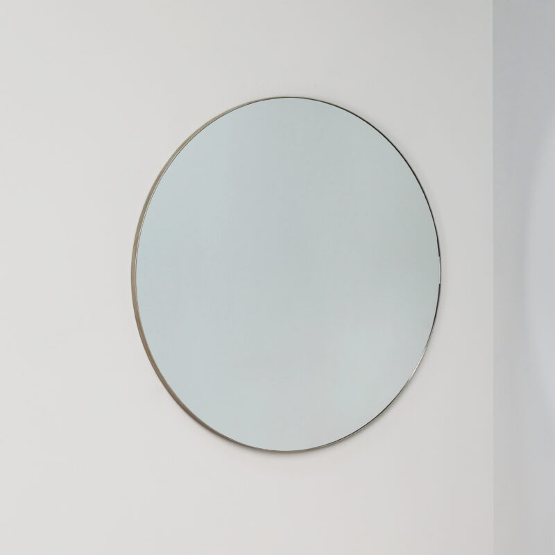 round contemporary designer mirror in silver