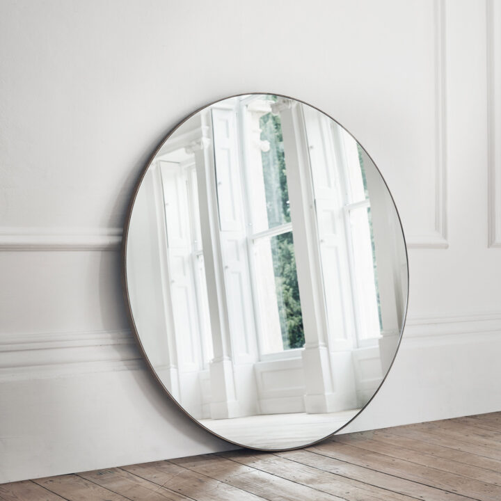 large round contemporary designer mirror