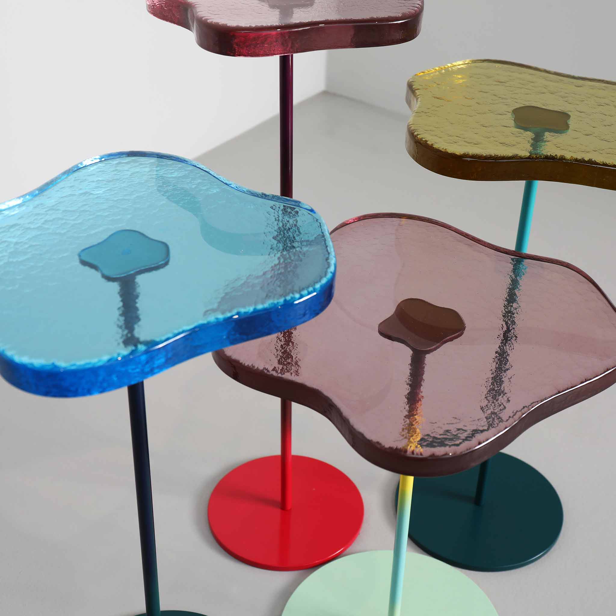 Finishes in "Butterfly" finishes with Venetian cast glass tops