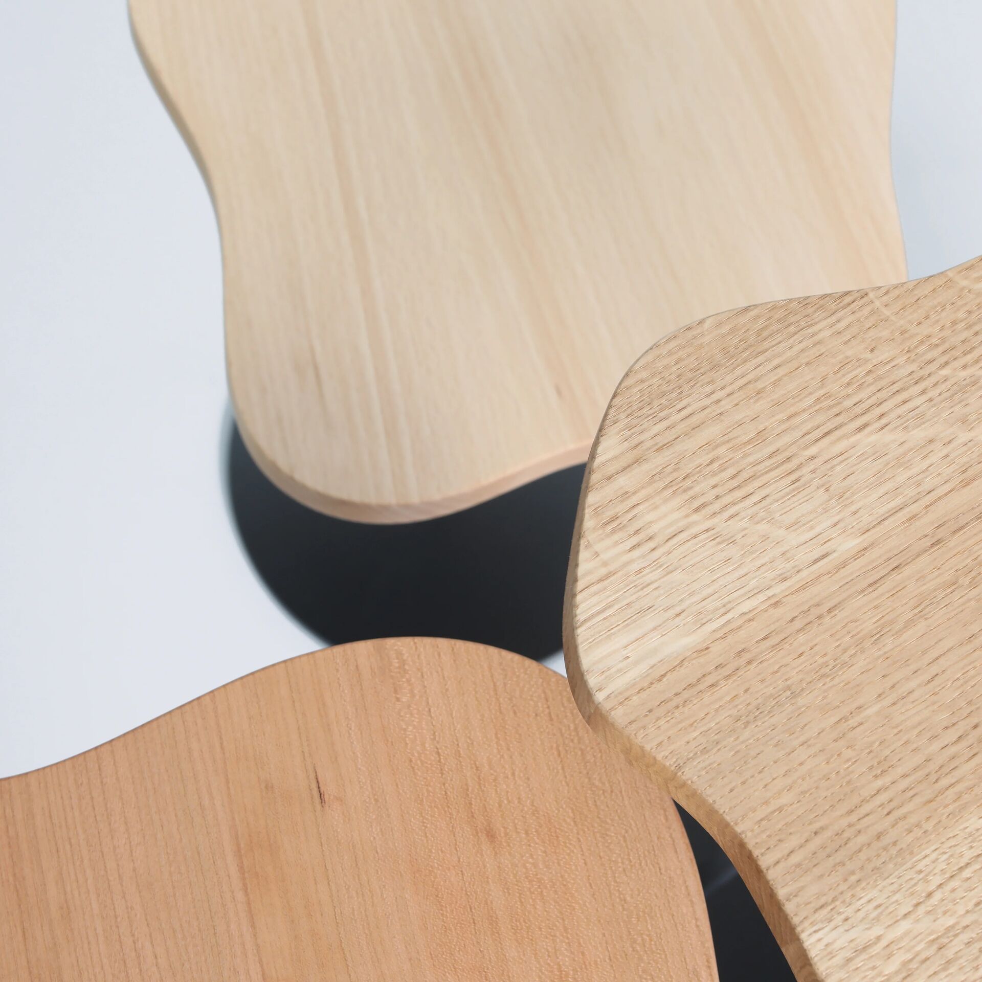 Lily Cocktail tables in Various Woods Detail – WordPress _ Website Image