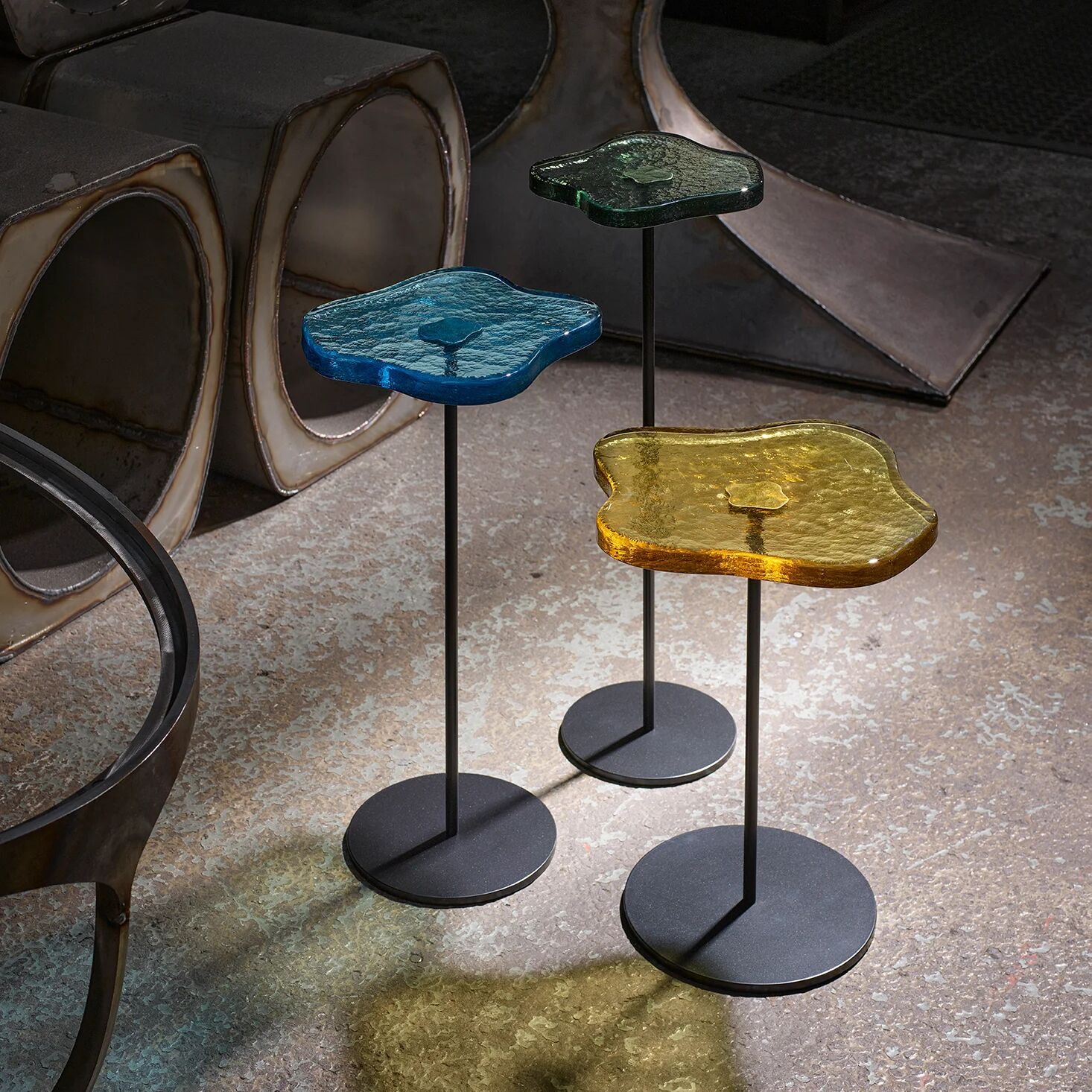 Lily cocktail tables, finished in "Anthracite" with Azure, Pine & Lemon tops