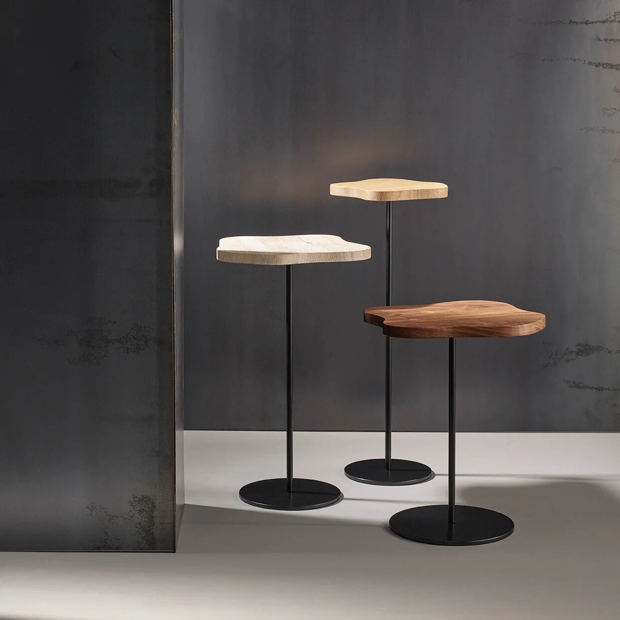 Lily cocktail tables, finished in "Anthracite" with London Plain, Oak & Walnut tops