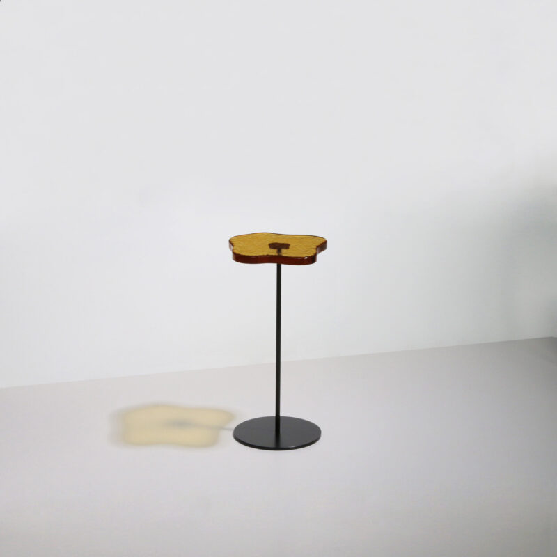 Yellow glass cocktail table