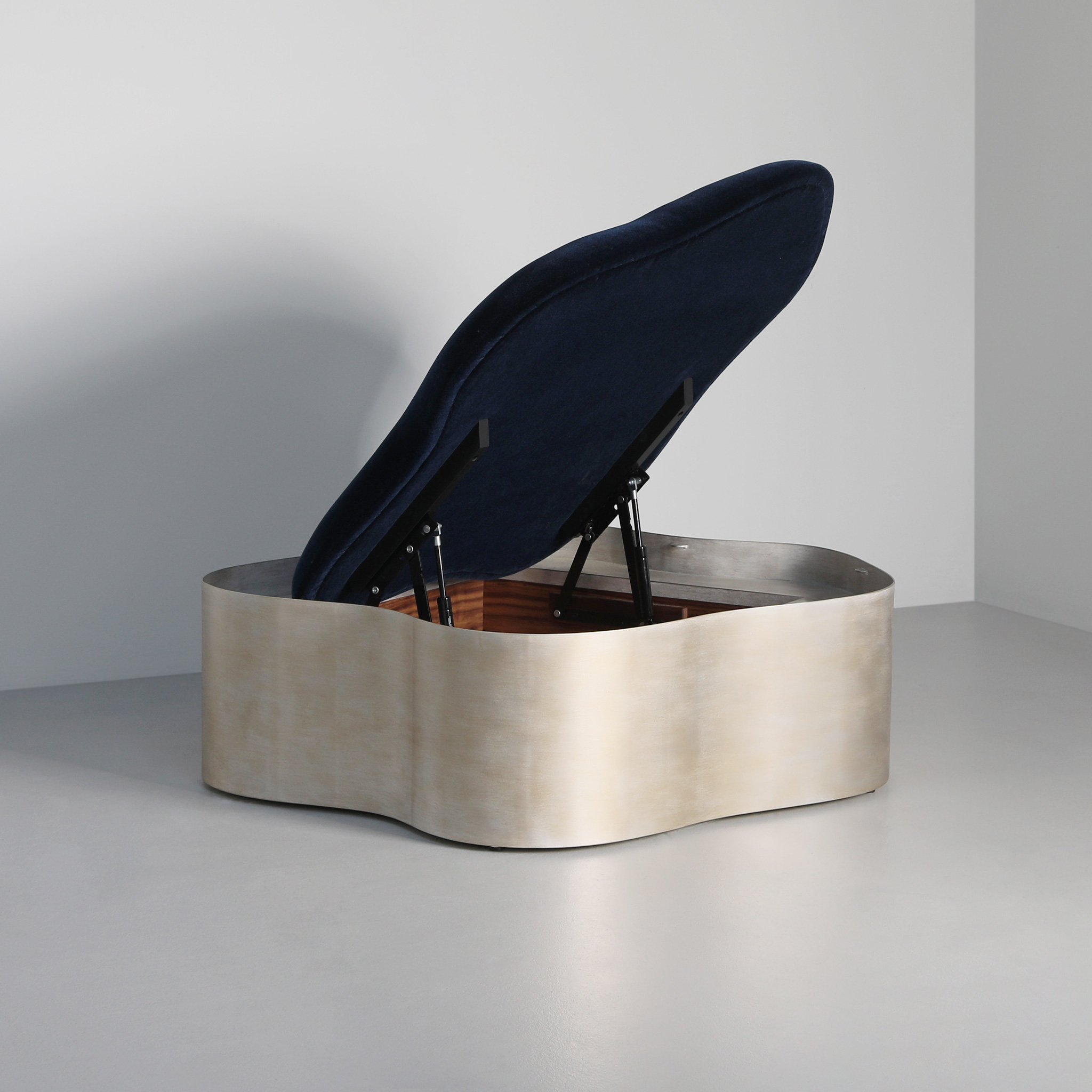 Finished in "Moon Silver" with navy mohair velvet upholstery