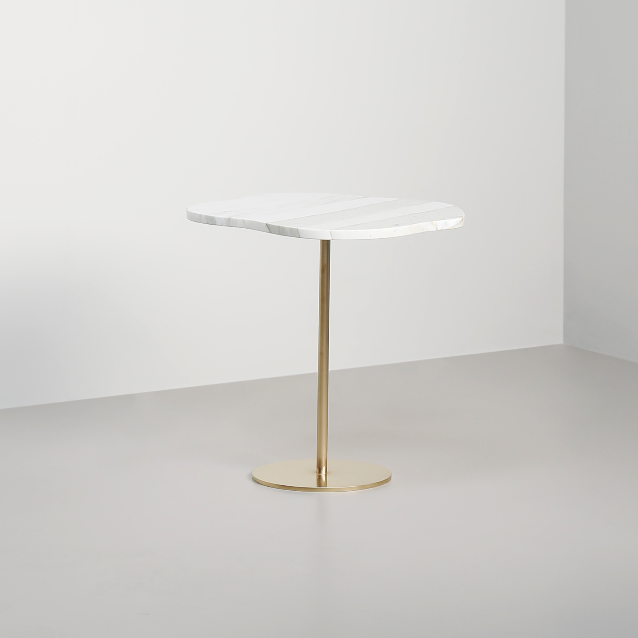 Polished Brass base with a Calacatta Oro marble top