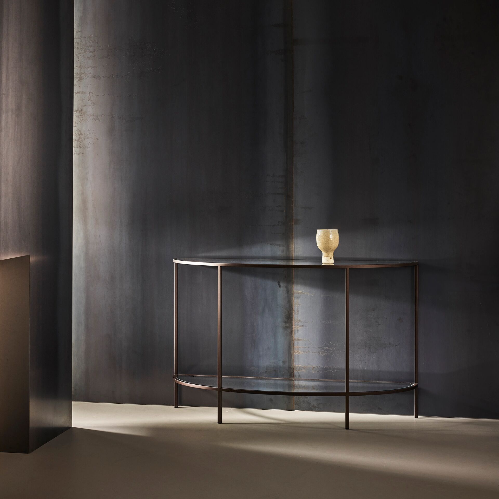 Madison finished in "Bronze" with standard clear glass top and shelf, medium