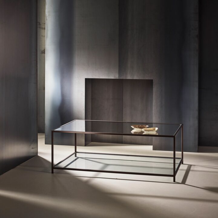 Madison finished in "Bronze" with standard clear glass top and shelf, medium