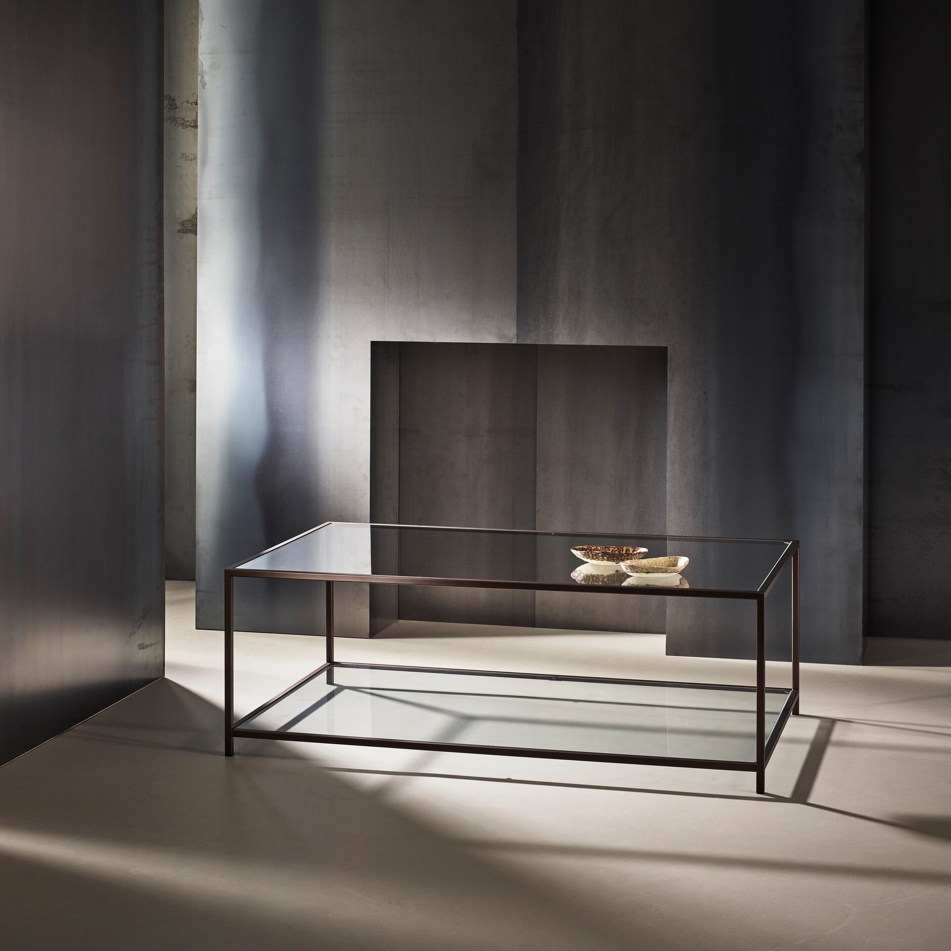 Madison finished in "Bronze" with standard clear glass top and shelf, medium