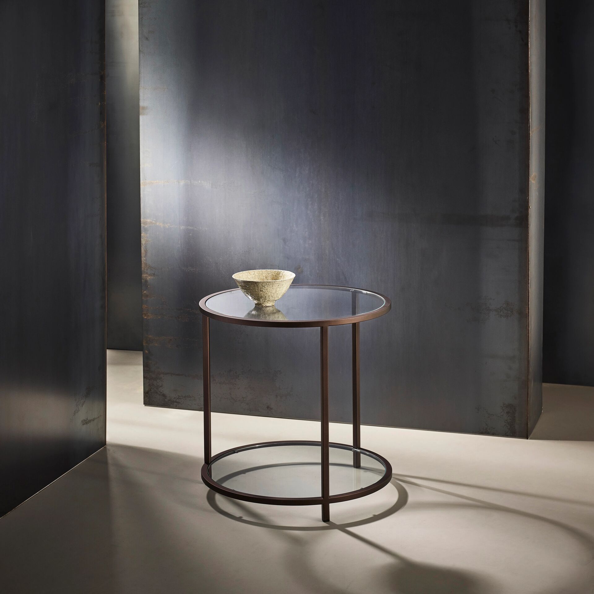 Madison finished in "Bronze" with standard clear glass top and shelf, medium