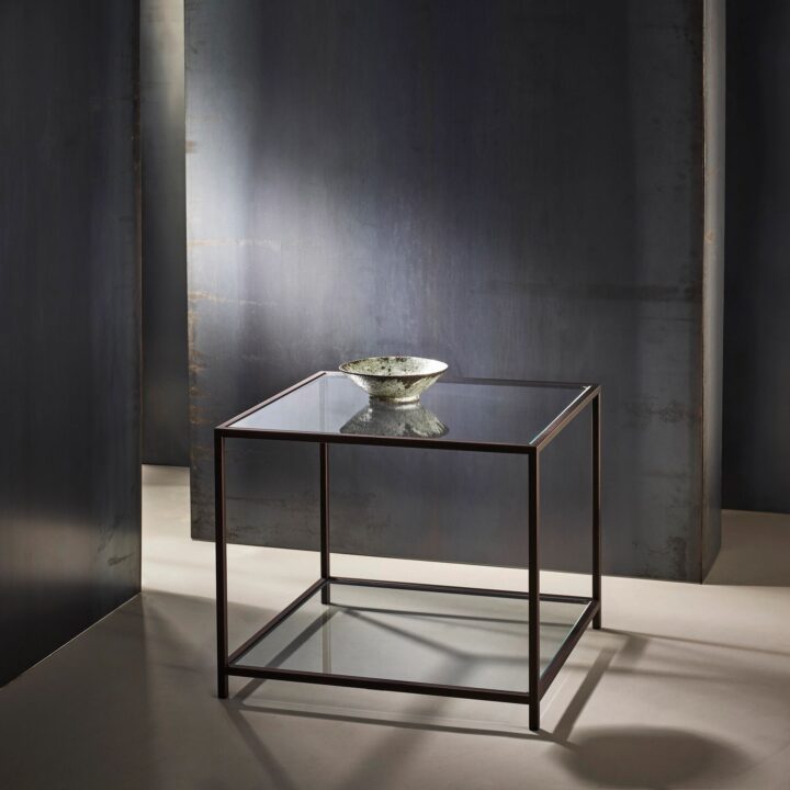 Madison finished in "Bronze" with standard clear glass top and shelf, large