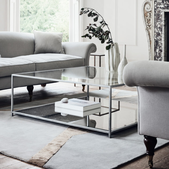 Finished in “Grey Silk” with mirrored shelf