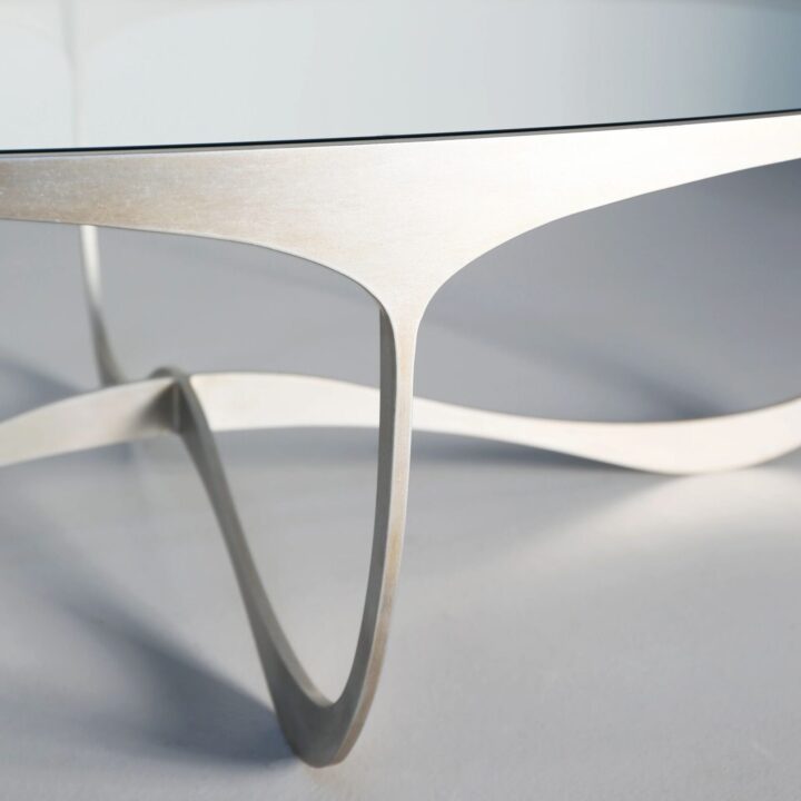 oval glass and metal coffee table
