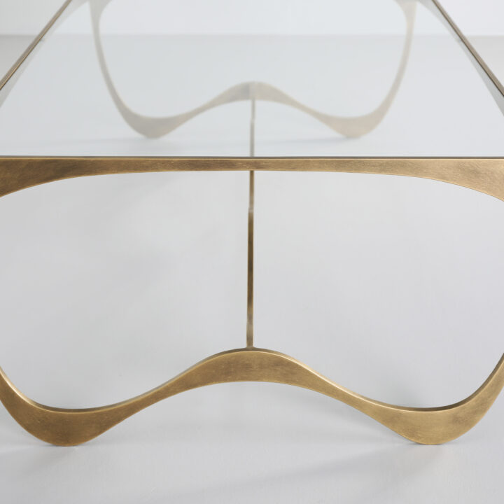 Finished in "Florentine Gold" with a clear glass top