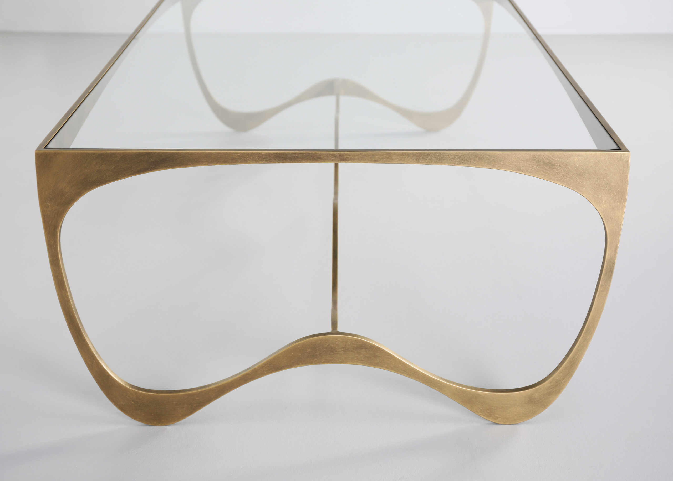 Finished in "Florentine Gold" with a clear glass top