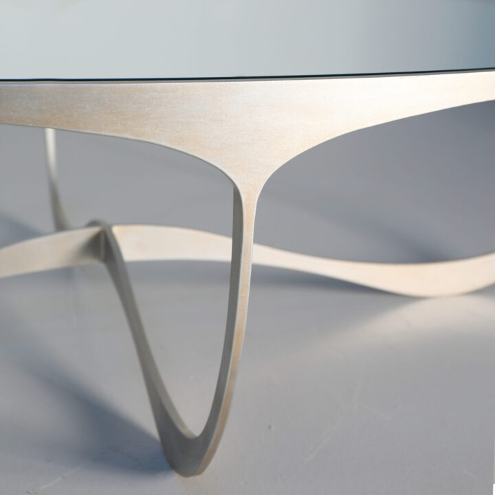 Glass top coffee table by Tom Faulkner