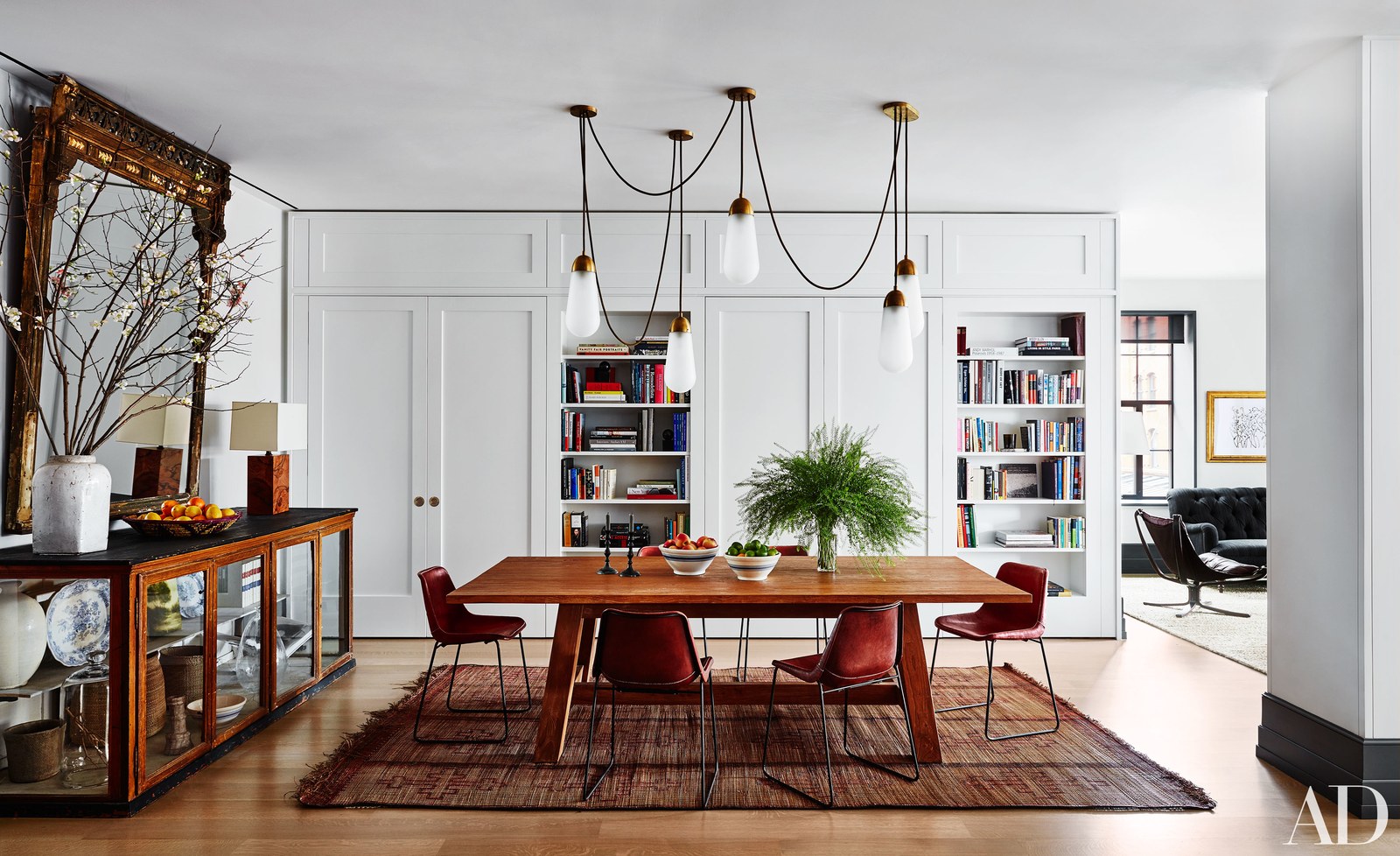 rectangular dining table with hanging pendant lights