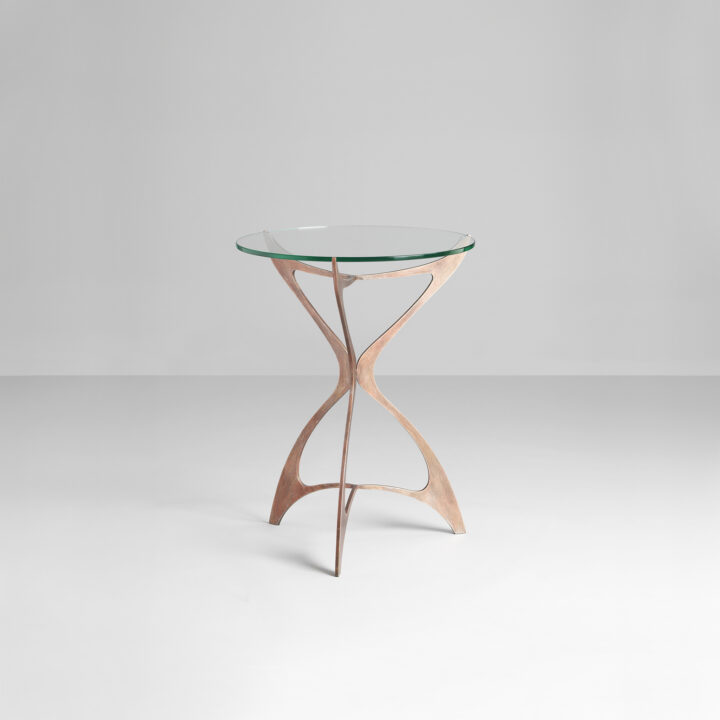 Finished in "Rose Pewter" with a clear glass top