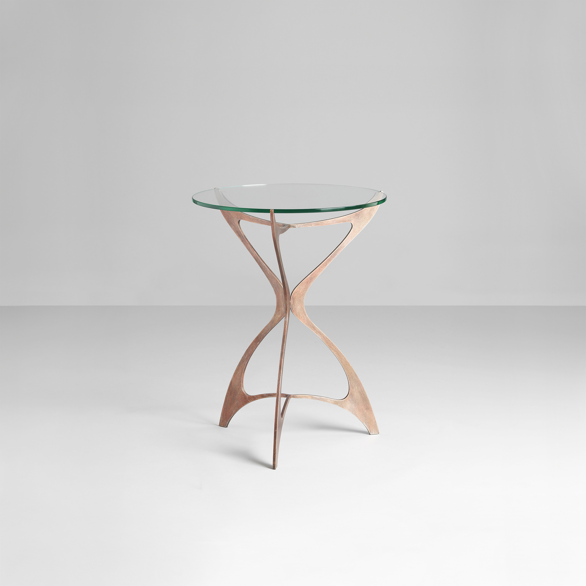 Finished in "Rose Pewter" with a clear glass top