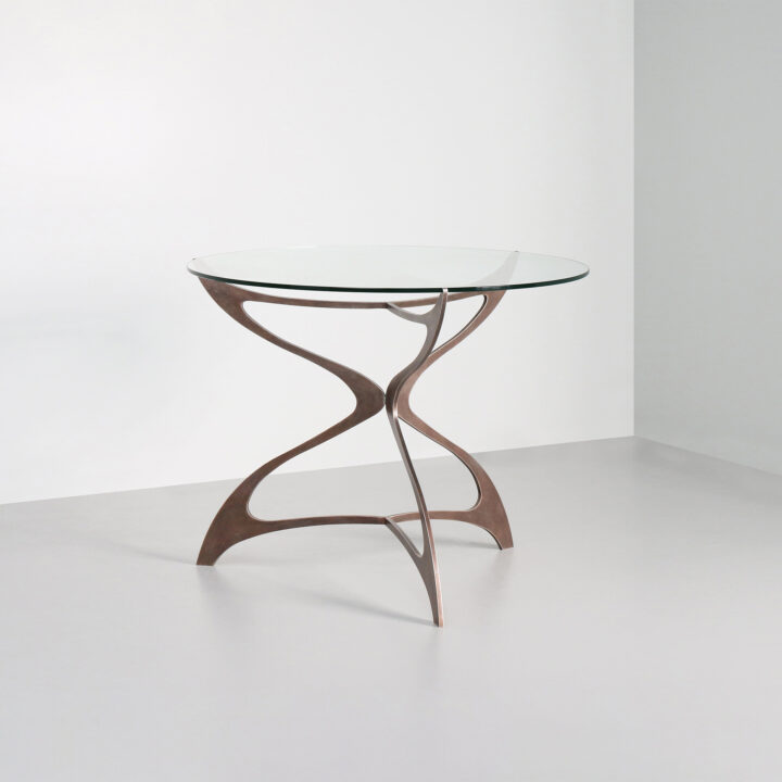 Finished in "Rose Pewter" with a clear glass top