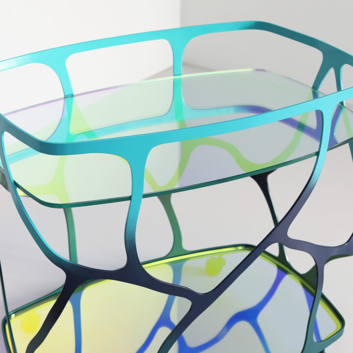 Finished in 'Ulysses Blue' with Dichroic glass top and shelf
